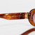 Miu Miu Striped Tobacco Oval Sunglasses