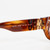 Miu Miu Striped Tobacco Irregular Sunglasses