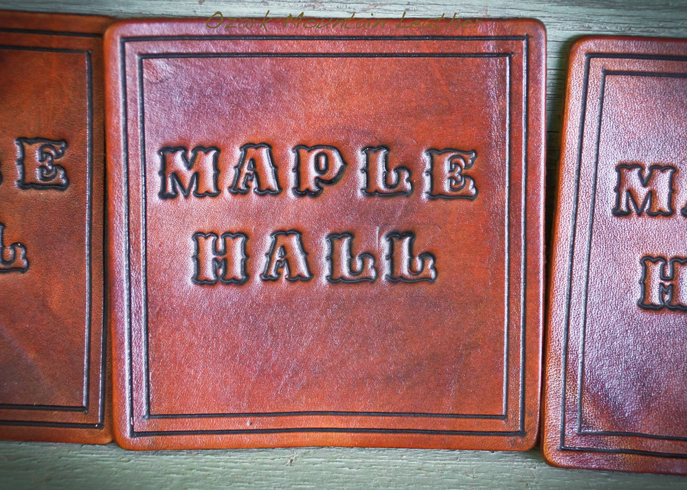 Custom Leather coaster set shown in dark brown.