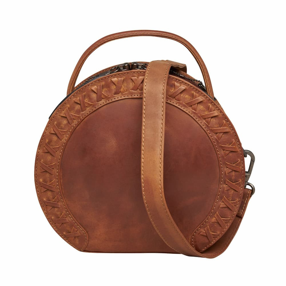 Round conceal and carry full grain leather crossbody bag.  Carries a full size firearm and made to last.