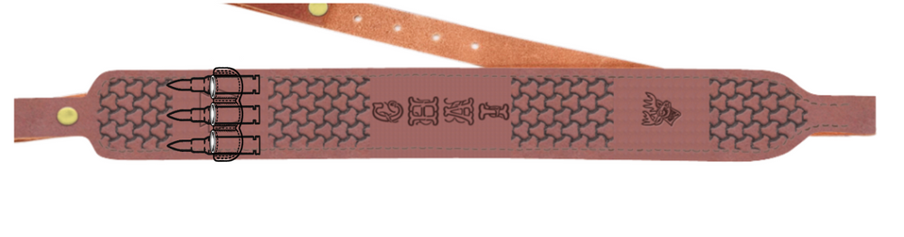Personalized leather rifle sling with ammo loops displayed in a natural outdoor setting. Austin brown full-grain leather with engraved name, designed for hunters who value durability and tradition.