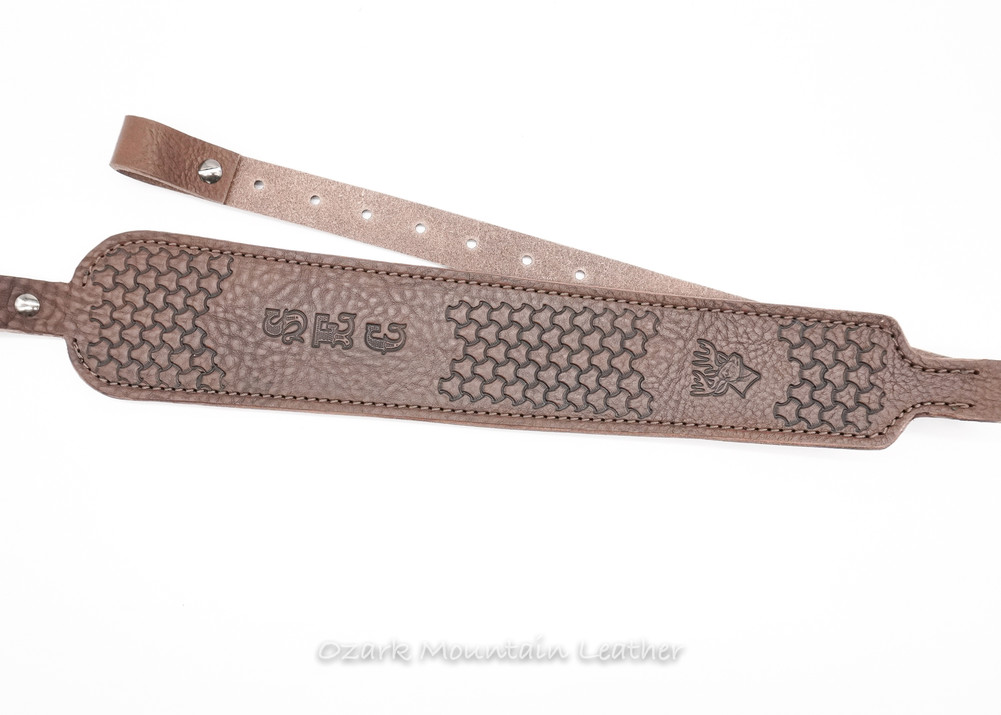 Custom leather rifle sling in chocolate brown.  Can be personalized with name or initials and also a custom stamp option. Cobra shape, cobra style rifle sling.