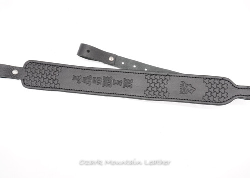 Custom black leather hand tooled padded leather rifle sling made in the USA.  Custom stamps available.  Custom name available.  Slim style gun sling in leather.  Shown in Black