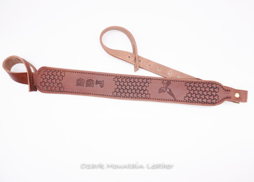 Handtooled leather shotgun sling for a gun without swivels or a no drill rifle sling made by Ozark Mountain Leather.