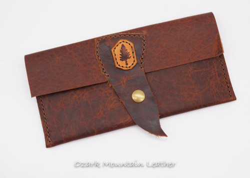 Bison leather clutch or wrist wallet.  Removable strap great travel wallet.