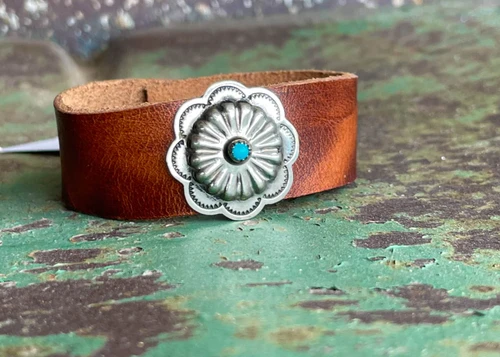 Vintage/antique sterling silver and turquoise cluster concho on the perfect piece of black leather.  Leather cuff bracelet By Ozark Mountain Leather