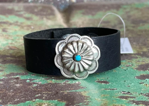Vintage/antique sterling silver and turquoise cluster concho on the perfect piece of black leather.  Leather cuff bracelet By Ozark Mountain Leather