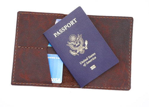 Custom bison leather passport cover.  Handmade in the USA personalized and customized. makes a great gift. Put a name or initials on the passport holder to make traveling unique.