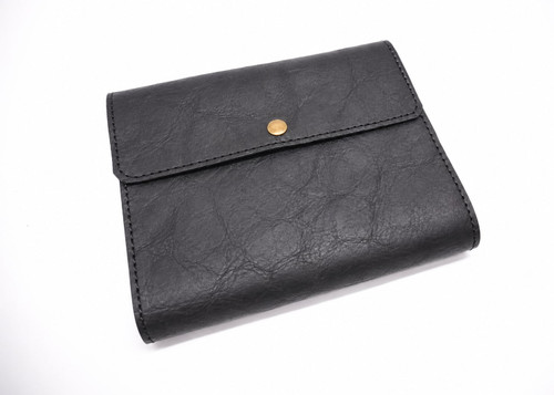 Close-up of flap and snap closure on custom black bison leather Bible cover American bison leather, handmade personalized, made to order, made just for you and your book, customize,