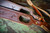 Custom full grain leather shotgun sling with thumb hole design Cobra style for a gun with no swivels or no drill sling.  Hunting or duck hunting sling