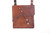 Bison leather crossbody bag mad with skeleton key closure adjustable strap