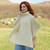 A453 162 Natural White Irish Merino Wool Patchwork Aran Cowl Cape Lifestyle Front View ExclusivelyIrish.com A453 162 Natural White Irish Merino Wool Patchwork Aran Cowl Cape Lifestyle Front View ExclusivelyIrish.com