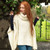 A453 162 Natural White Irish Merino Wool Patchwork Aran Cowl Cape Lifestyle Front View ExclusivelyIrish.com A453 162 Natural White Irish Merino Wool Patchwork Aran Cowl Cape Lifestyle Front View ExclusivelyIrish.com