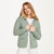 B940 373 Seafoam Green Ladies Buttoned Cabled Cardigan Lifestyle Front View ExclusivelyIrish.com B940 373 Seafoam Green Ladies Buttoned Cabled Cardigan Lifestyle Front View ExclusivelyIrish.com