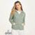 B940 373 Seafoam Green Ladies Buttoned Cabled Cardigan Lifestyle Front View ExclusivelyIrish.com B940 373 Seafoam Green Ladies Buttoned Cabled Cardigan Lifestyle Front View ExclusivelyIrish.com