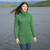 ML114 105 Green Soft Touch Ladies Aran Zip Cardigan Lifestyle Front View ExclusivelyIrish.com