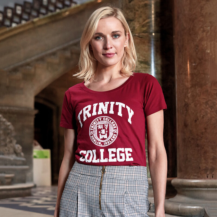 TRIN4000 Burgundy/White Trinity College Seal Ladies T-Shirt Lifestyle Fron View ExclusivelyIrish.com