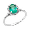 White Gold Halo Solitaire Zambian Emerald and Diamond Proposal Ring
