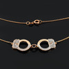 Handcuffs necklace with diamond accents in 14k rose gold.