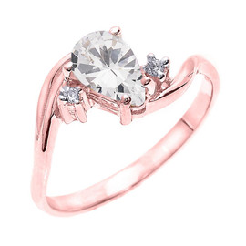 Rose Gold Pear Shaped CZ and Diamond Proposal Ring