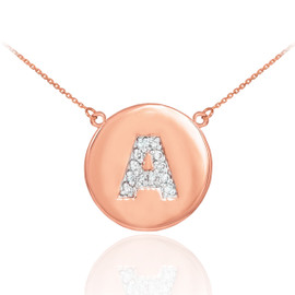 Letter "A" disc necklace with diamonds in 14k rose gold.
