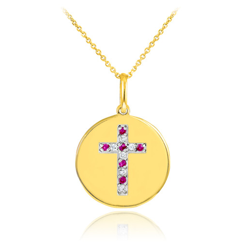 Cross disc pendant necklace with diamonds and rubies in 14k gold.