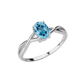 Dainty White Gold Infinity Design Blue Topaz (LCBT) Solitaire Ring