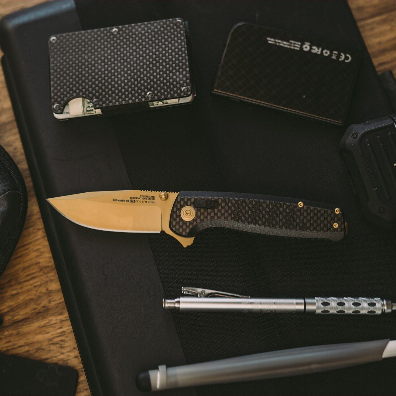 SOG Terminus XR LTE Flipper Knife 2.95" Gold TiNi S35VN Clip Point Blade, Carbon Fiber Handles - XR Lock - TM1033-BX