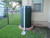 PM250RH - 250 Gallon Rain Harvesting Tank installed in Dark Green