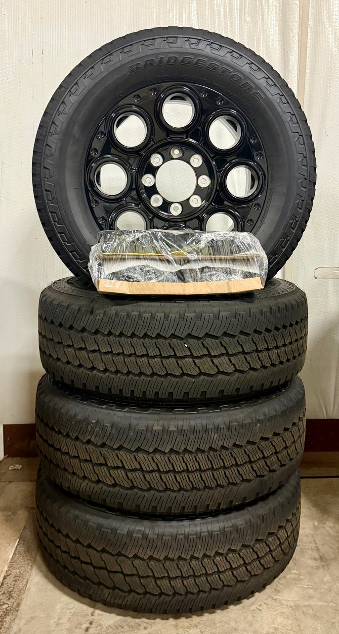 New Takeoff Ford F250 F350 Gloss Black 20" OEM Wheels with Bridgestone 275/65R20 All Terrain Tires