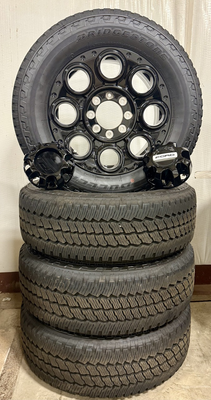 New Takeoff Ford F250 F350 Gloss Black 20" OEM Wheels with Bridgestone 275/65R20 All Terrain Tires