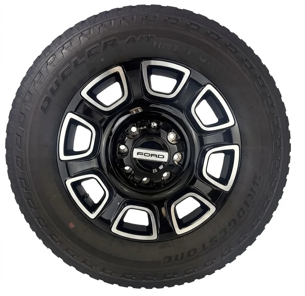 Set Of Four New Takeoff Ford F250 Black And Machine Wheels With 275/65R20 Bridgestone A/T Tires