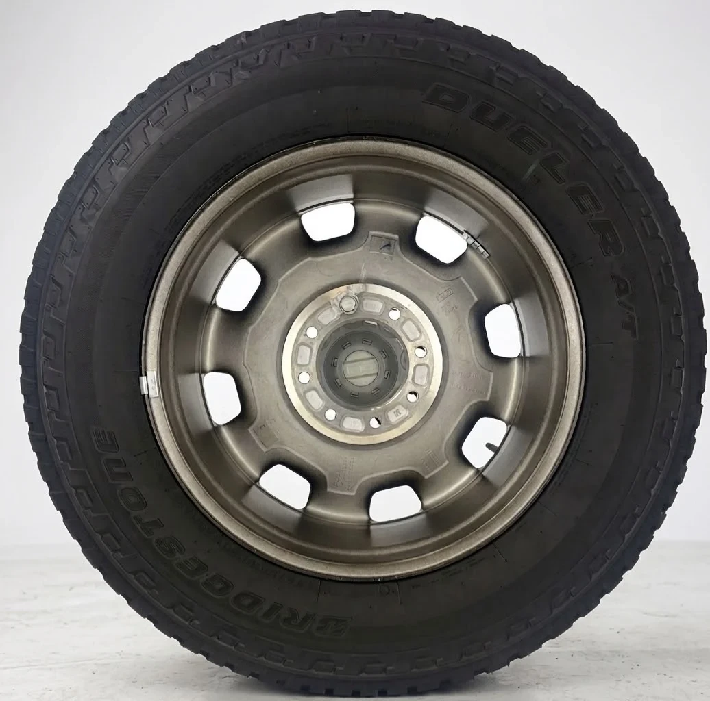 Set Of Four New Takeoff Ford F250 Black And Machine Wheels With 275/65R20 Bridgestone A/T Tires