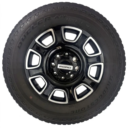 Set Of Four New Takeoff Ford F250 Black And Machine Wheels With 275/65R20 Bridgestone A/T Tires