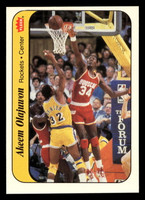 1986-87 Fleer Stickers #9 Akeem Olajuwon Near Mint  ID: 406632