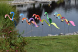 Flamingos dancing garden art that moves with the wind atop 35" stakes, made in Michigan, USA.
