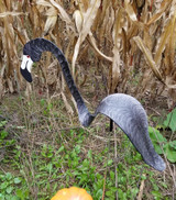 Flamingos dancing garden art that moves with the wind atop 35" stakes, made in Michigan, USA.