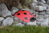 Ladybug dancing garden art that moves with the wind atop a 17.5" stake, made in Michigan, USA.