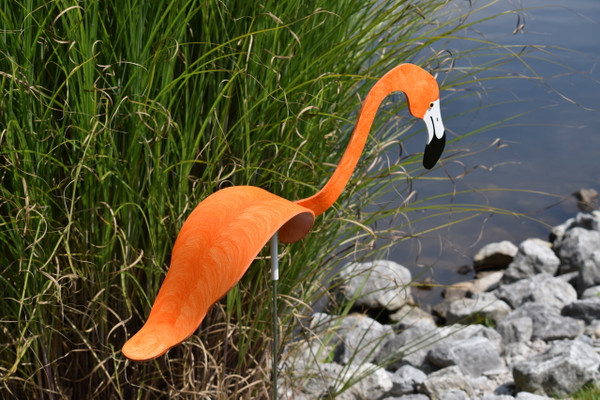 Flamingos dancing garden art that moves with the wind atop 35" stakes, made in Michigan, USA.