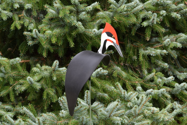 Pileated Woodpecker dancing garden art that moves with the wind atop a 35" stake, made in Michigan, USA.