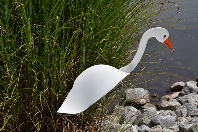 Snow Goose dancing garden art that moves with the wind atop a 35" stake, made in Michigan, USA.