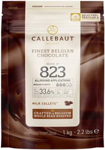 Front of Callebaut 823 Milk Callets 33.6% 1kg bag showing product branding, cocoa percentage, and usage details. Label highlights medium fluidity, allround applications, and that the chocolate is crafted in Belgium from whole bean roasted cocoa. Front of Callebaut 823 Milk Callets 33.6% 1kg bag showing product branding, cocoa percentage, and usage details. Label highlights medium fluidity, allround applications, and that the chocolate is crafted in Belgium from whole bean roasted cocoa.