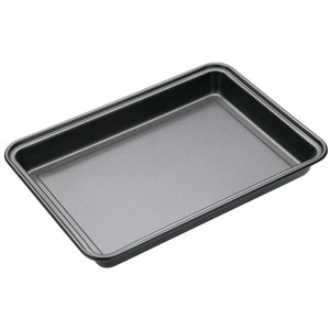 Bake perfect brownies and traybakes with the MasterClass Non-Stick Brownie Pan 34cm x 20cm. Durable, easy to clean and designed for consistent results. Bake perfect brownies and traybakes with the MasterClass Non-Stick Brownie Pan 34cm x 20cm. Durable, easy to clean and designed for consistent results.