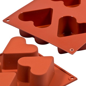Create heart shaped desserts with the Silikomart Heart Silicone Mould. 6 non-stick cavities, oven safe and freezer safe. Ideal for cakes, jellies and more. Create heart shaped desserts with the Silikomart Heart Silicone Mould. 6 non-stick cavities, oven safe and freezer safe. Ideal for cakes, jellies and more.