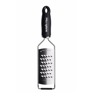 Microplane Gourmet Series Extra Coarse Grater with ultra-sharp stainless steel blades. Perfect for cheese, vegetables, and fruit. Dishwasher safe. Microplane Gourmet Series Extra Coarse Grater with ultra-sharp stainless steel blades. Perfect for cheese, vegetables, and fruit. Dishwasher safe.