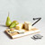 Buy the Artesà Traditional Cheese Slicer. Hand-finished acacia wood serving board with built-in wire slicer, perfect for cheeseboards, entertaining and gifting.