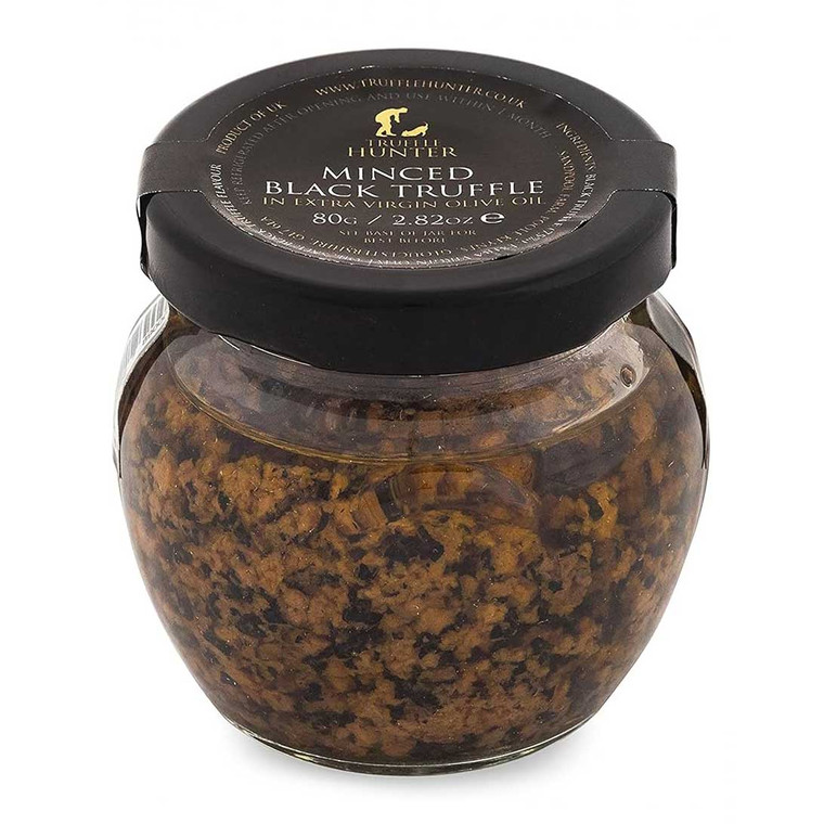 Truffle Hunter Minced Black Truffle 80g finely chopped black truffle for sauces, pasta and eggs. Rich, earthy flavour and easy to use.