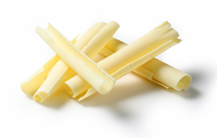 Callebaut White Chocolate Curved Shavings 2.5kg. Creamy white chocolate curls perfect for decorating cakes, pavlova, tarts and plated desserts.