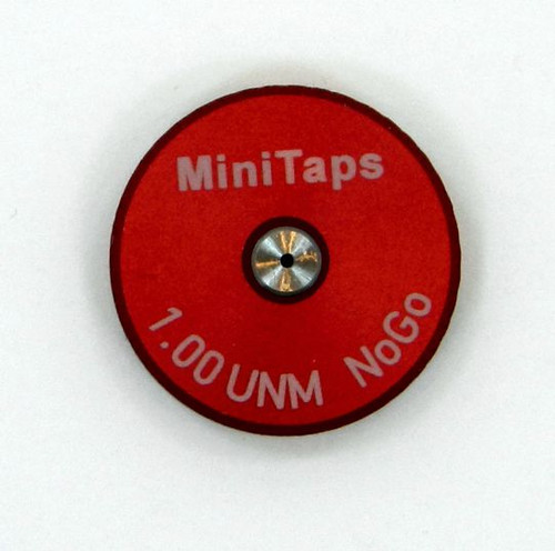 Metric Thread Ring Gage 1.00UNM also M1.0 pitch 0.25mm Class 6g; "No-Go" Ring member Precision Thread Gage made of High Speed Steel then hardened. Brand is Minitaps Made in Switzerland to our specifications. Picture is Front side view of the gage.