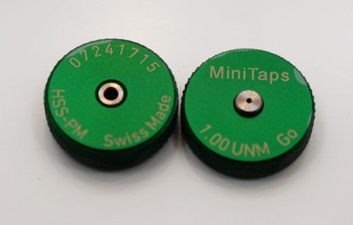 Metric Thread Ring Gage 1.00UNM also M1.0 pitch 0.25mm Class 6g; "Go" Ring member Precision Thread Gage made of High Speed Steel then hardened. Brand is Minitaps Made in Switzerland to our specifications. Picture is representative of the gage front and back side.